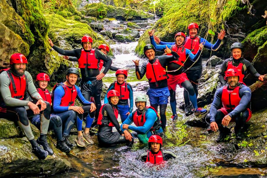 BLAST Fit community canyoning trip — members celebrating together